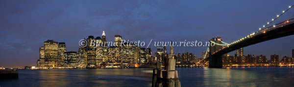 New York / Evening at Manhattan. New York skyline and Brooklyn Bridge